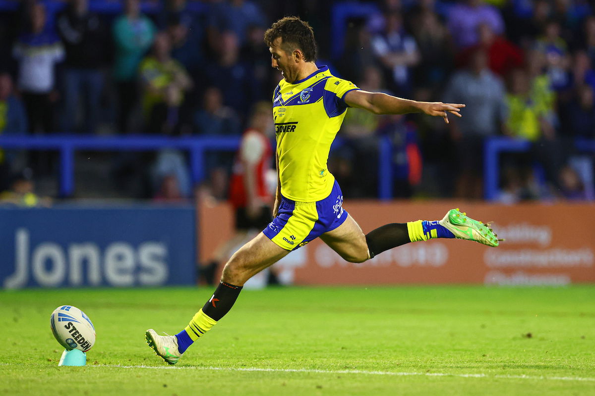 Warrington Wolves veteran Stefan Ratchford kicking a rugby ball